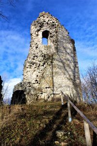 Low angle view of castle against blue sky