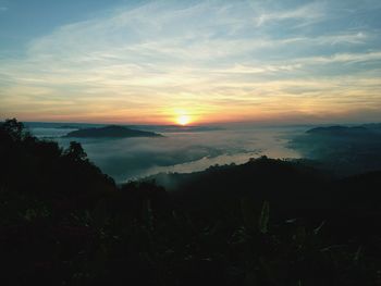 Scenic view of sea against sky during sunset