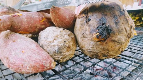 High angle view of meat on barbecue grill