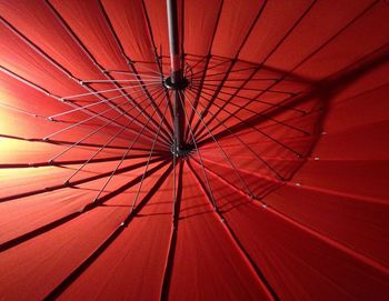 Low angle view of red umbrella