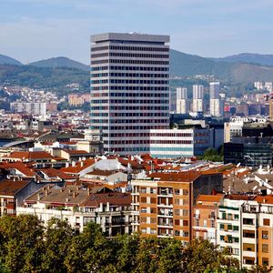 High angle view of buildings in city against sky
