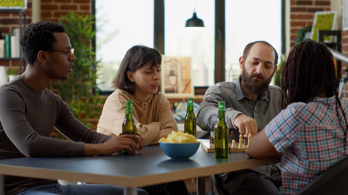 Friends having food at restaurant