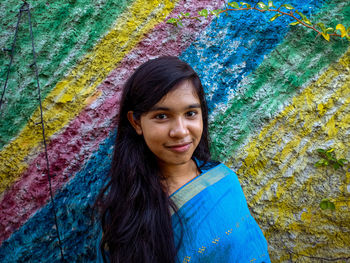 Portrait of smiling young woman