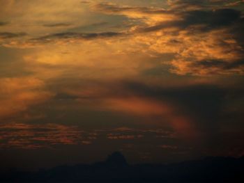 Low angle view of dramatic sky during sunset