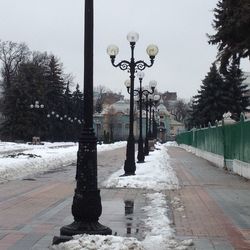 Street light on footpath in winter