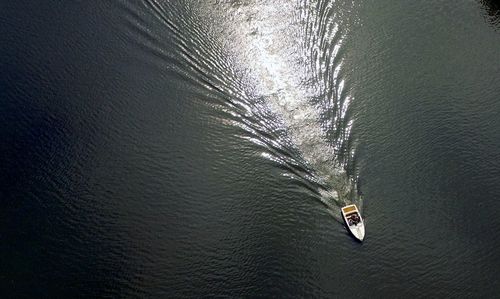 High angle view of motorboat in canal