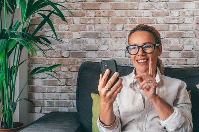 Young woman using mobile phone