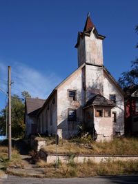 Low angle view of old building against sky