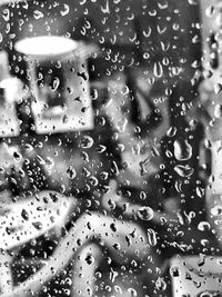 Full frame shot of wet window in rainy season