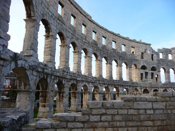 Ruins of historical building against sky