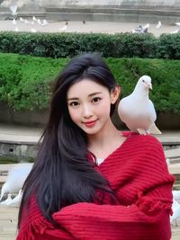 Portrait of young woman looking away