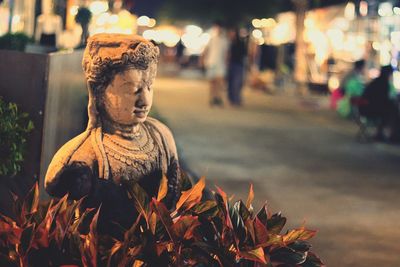 Close-up of angel statue during autumn