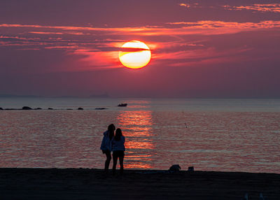 Warm summer sunrise over the ocean in new hampshire.