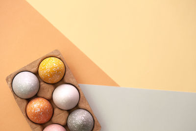 High angle view of candies in box on table