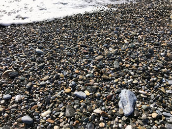 Close-up of pebbles on beach