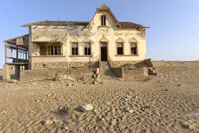 Exterior of old building against clear sky