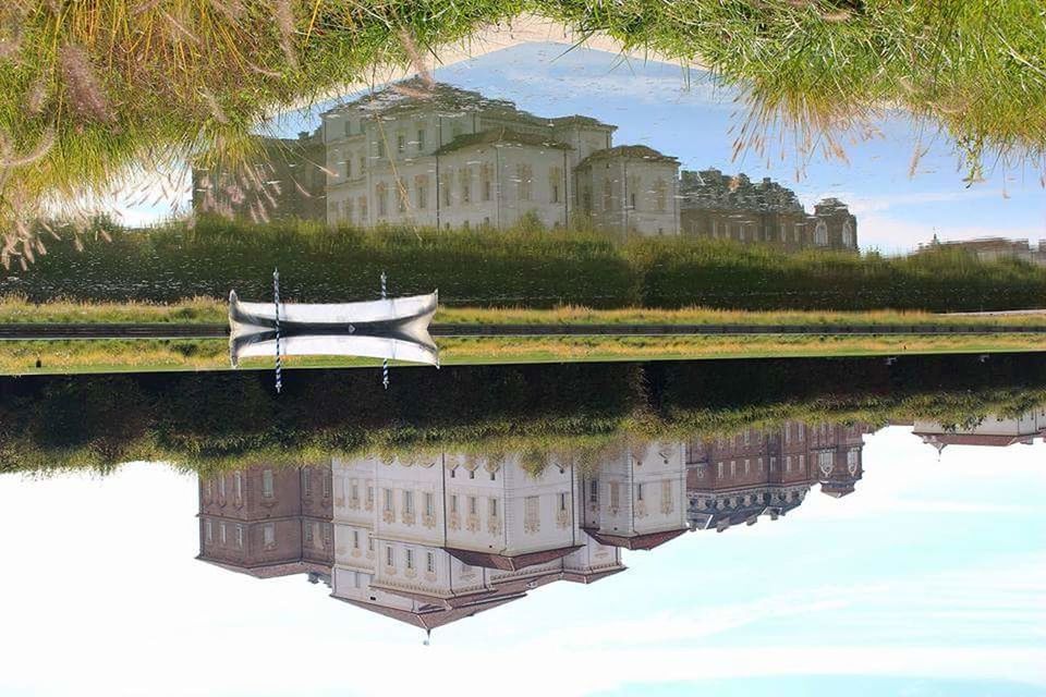 reflection, water, lake, tree, symmetry, standing water, no people, architecture, waterfront, sky, outdoors, nature, nautical vessel, building exterior, day