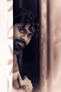 Portrait of young man with reflection