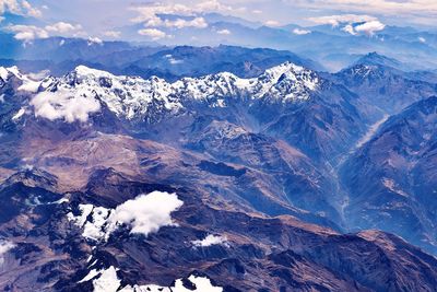 Scenic view of snowcapped mountains against sky - high angel view andes peru