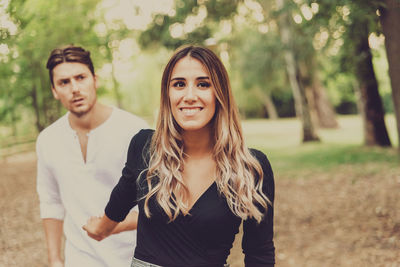 Couple standing at park