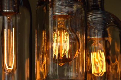 Close-up of illuminated light bulb