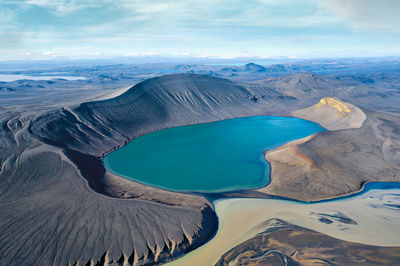 Panoramic view of volcanic landscape against sky