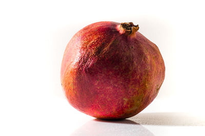 Close-up of apple against white background