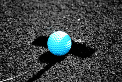 Close-up of ball balls on floor