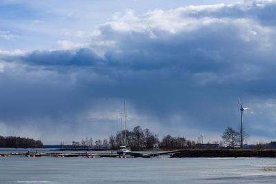 View of lake against cloudy sky