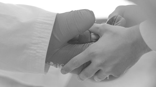 Close-up of hand with glove for martial arts