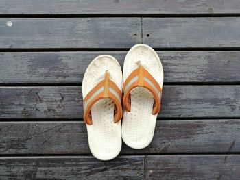 High angle view of flip-flop on table