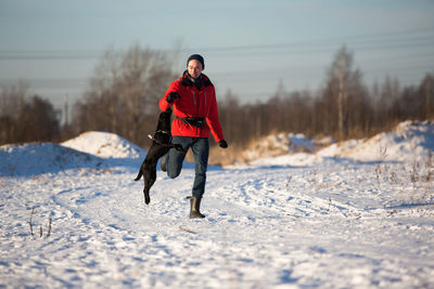 Full length of man on snow field
