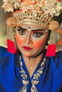 The expression of a legong dancer