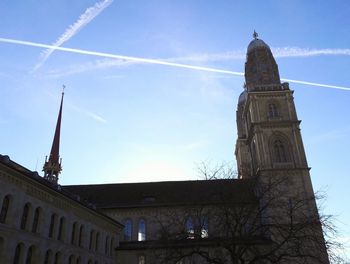 Low angle view of church against blue sky