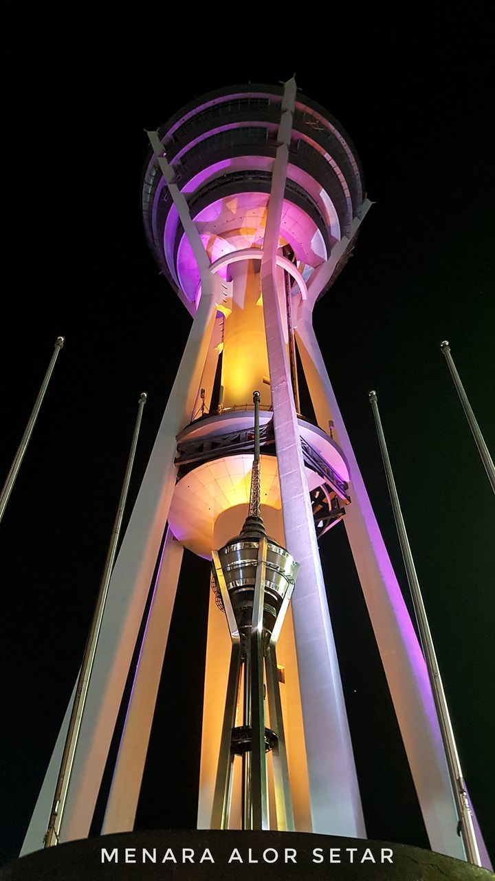 illuminated, night, low angle view, amusement park, amusement park ride, arts culture and entertainment, architecture, no people, built structure, lighting equipment, sky, multi colored, glowing, ferris wheel, purple, building exterior, spinning, metal, nature, outdoors, fairground, nightlife