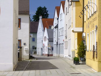 Alley amidst buildings in town