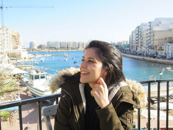 A wonderful day in malta. portrait of smiling woman in city against sky