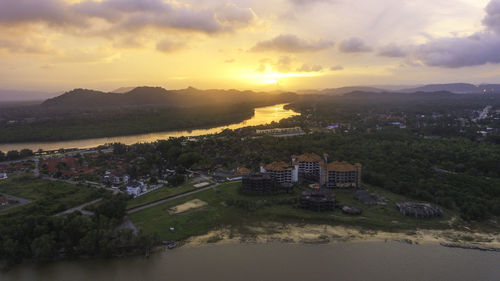 High angle view of city against sky during sunset