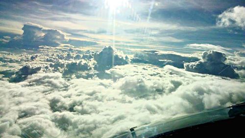 Scenic view of landscape against cloudy sky