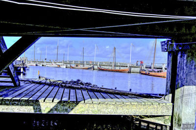 Panoramic view of illuminated bridge against sky