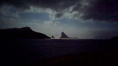 Scenic view of sea against sky at dusk