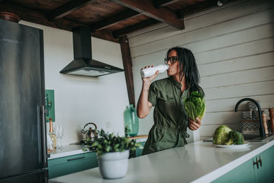 Woman standing at home