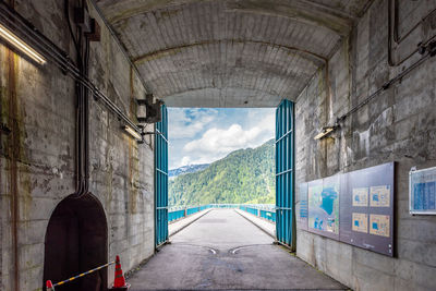 Empty road leading to tunnel