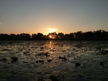 Scenic view of sea against sky during sunset