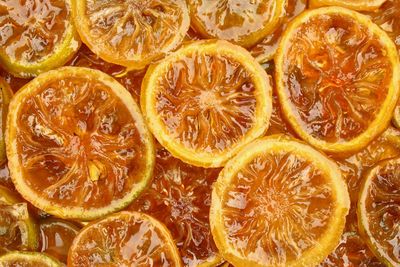 Full frame shot of lemon sliced candy photo background top view 