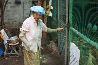 Senior woman working at farm