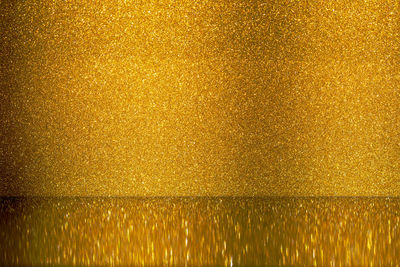 Full frame shot of gold glitter