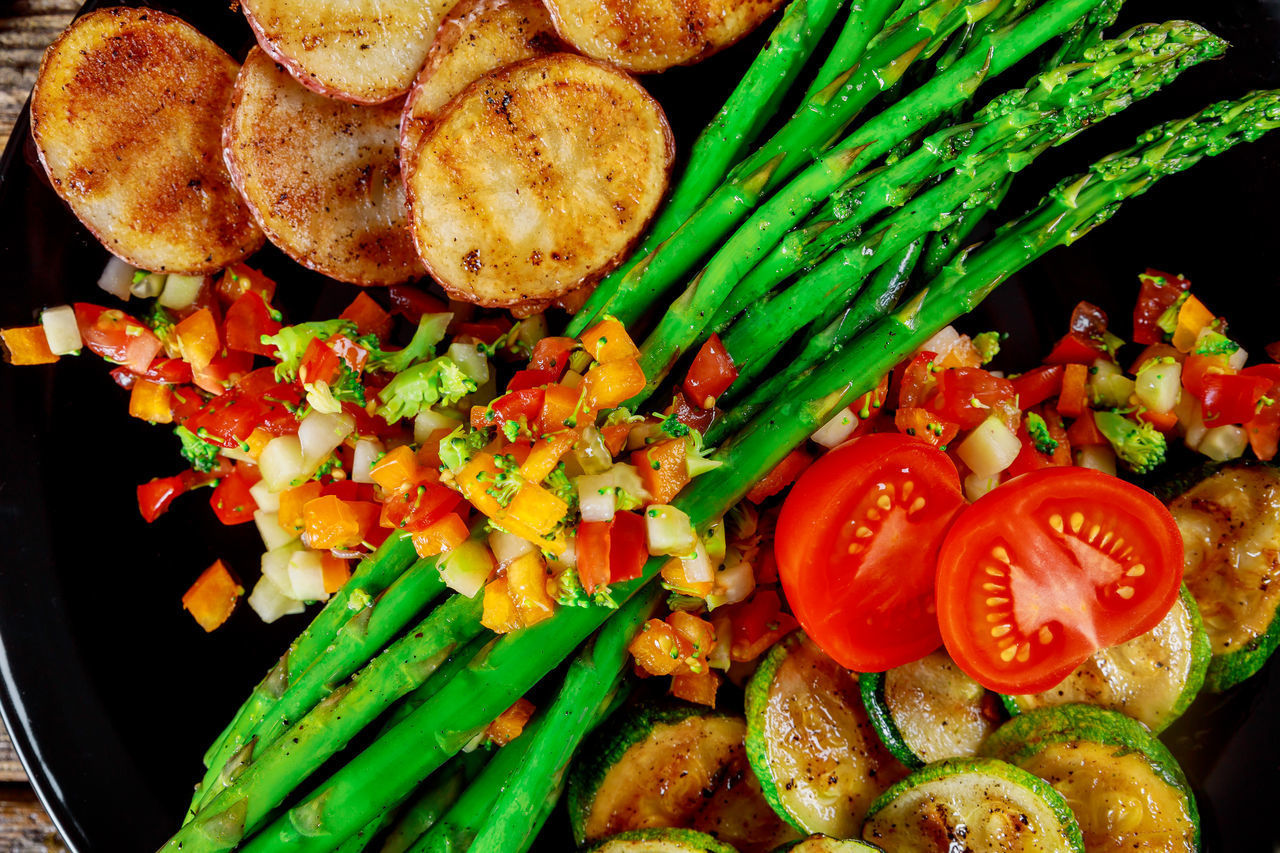 HIGH ANGLE VIEW OF CHOPPED VEGETABLES IN CONTAINER