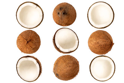 Directly above shot of eggs against white background