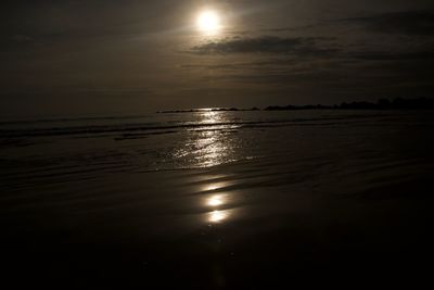 Scenic view of sea against sky at sunset